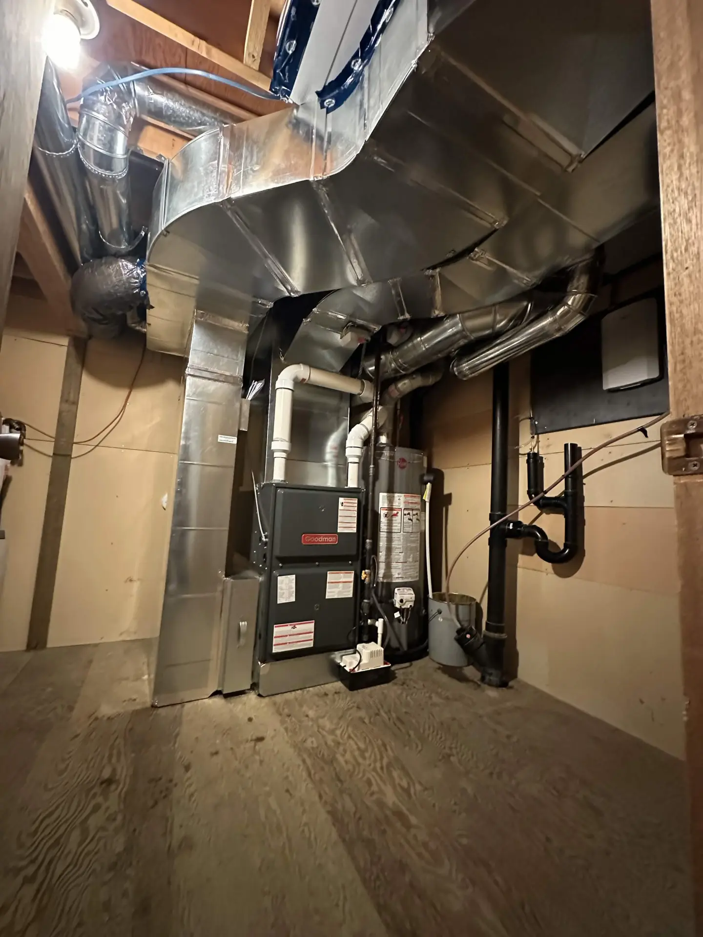 Goodman furnace and hot water tank with new ductwork and venting
