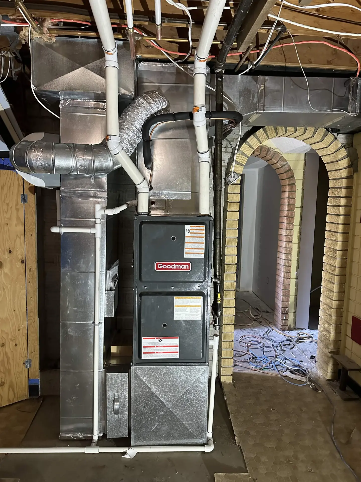 Goodman furnace with new sheet metal ductwork in a basement