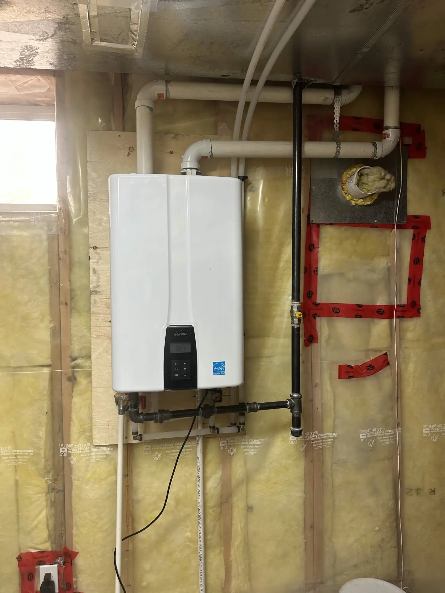 Navien tankless water heater with intake and exhaust venting